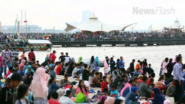 NEWS FLASH: Libur Panjang Pengunjung Ancol Membeludak