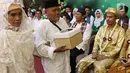 Peserta menjalani rangkaian kegiatan nikah massal bertajuk PKB Mantu di Jakarta, Jumat (25/8). Sebanyak 103 pasangan turut ambil bagian pada nikah massal tersebut yang berasal dari lima wilayah di Jakarta. (Liputan6.com/Immanuel Antonius)