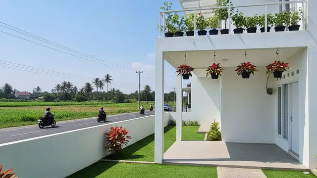Desain Landscape Rumah di Desa Dekat Jalan Raya. AI
