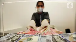 Rupiah Ditutup Menguat, Turunnya Harga Minyak Redakan Tekanan Pasar