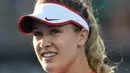 Eugenie Bouchard dinobatkan beberapa situs olahraga dan tenis sebagai salah satu petenis tercantik di dunia pada 2015. Genie adalah petenis putri Kanada pertama yang berhasil menembus final kejuaraan Grand Slam kelas tunggal. (PETER PARKS/AFP)