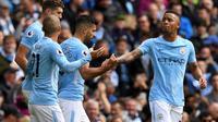 Para pemain Manchester City merayakan gol ke gawang Liverpool pada laga Premier League di Stadion Etihad, Manchester, Sabtu (9/9/2017). (AFP/Paul Ellis)