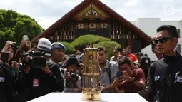 Api obor Asian Games saat tiba di Banda Aceh, Selasa (31/7). Kirab Obor (torch relay) dimulai dari Museum Aceh dan berakhir di Kantor Gubernur Aceh. (Liputan6.com/Immanuel Antonius)