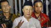 Mantan Kepala BPPN, Syafruddin Arsyad Temenggung memberi keterangan saat meninggalkan rumah tahanan KPK, Jakarta, Selasa (7/9/2019). Sebelumnya, Mahkamah Agung mengabulkan permohonan kasasi yang diajukan Syafruddin Arsyad Temenggung dalam kasus korupsi SKL BLBI. (Liputan6.com/Helmi Fithriansyah)