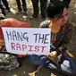 Aksi menentang pemerkosaan India (Reuters)
