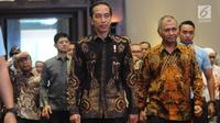 Presiden Joko Widodo (Jokowi) didampingi Ketua KPK Agus Rahardjo menghadiri Peringatan Hari Anti Korupsi Sedunia 2018 di Jakarta, Selasa (4/12). Acara ini mengambil tema Menuju Indonesia Bebas Dari Korupsi. (Liputan6.com/Angga Yuniar)