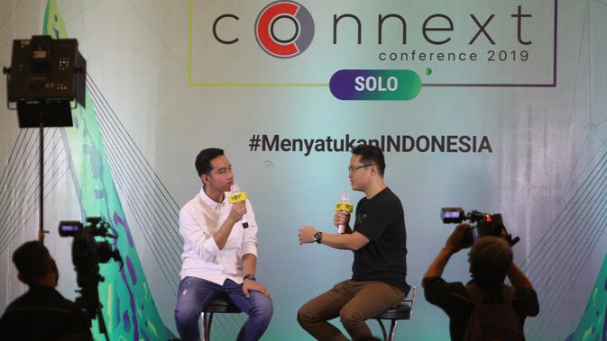 Gibran Rakabuming Raka saat menjadi pembicara di Solo, Sabtu (19/10).(Liputan6.com/Fajar Abrori)