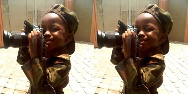 Fuji dengan kamera SLR nya | (c) HuffingtonPost