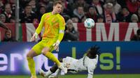 Bermain dengan 10 orang, Bayern Munchen menyerah 0-1. Sementara Bayer Leverkusen melaju ke babak delapan besar DFB Pokal alias Piala Liga Jerman 2024/2025. (AFP/Michaela Stache)