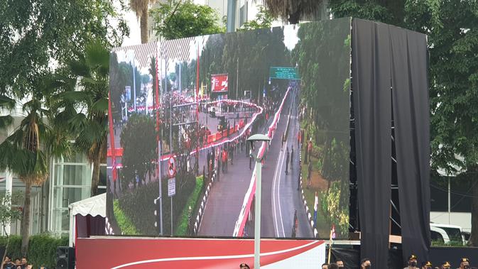 Presiden Jokowi bersama Kapolri Jenderal Listyo Sigit Prabowo dan Habib Luthfi bin Yahya melepas Kirab Merah Putih dari Istana Merdeka, Jakarta Pusat, Minggu (28/8/2022). Dalam kirab tersebut, peserta membentangkan bendera merah putih sepanjang 1.700 meter. (/Nanda Perdana Putra)