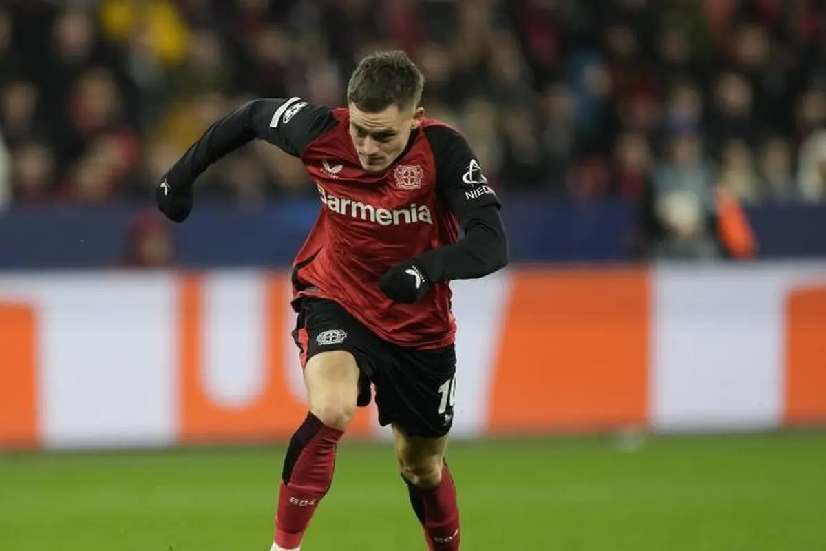 Aksi pemain Bayer Leverkusen Florian Wirtz di Liga Champions 2024/2025. (c) AP Photo/Martin Meissner