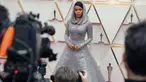 Aktris dan penyanyi Janelle Monae menghadiri ajang Academy Awards ke-92 di Dolby Theatre, Los Angeles, Minggu (9/2/2020). Monae yang hadir sebagai salah satu penampil di Oscar 2020 ini menarik perhatian dalam balutan gaun silver Ralph Lauren dengan detail tudung. (Neilson Barnard/Getty Images/AFP)
