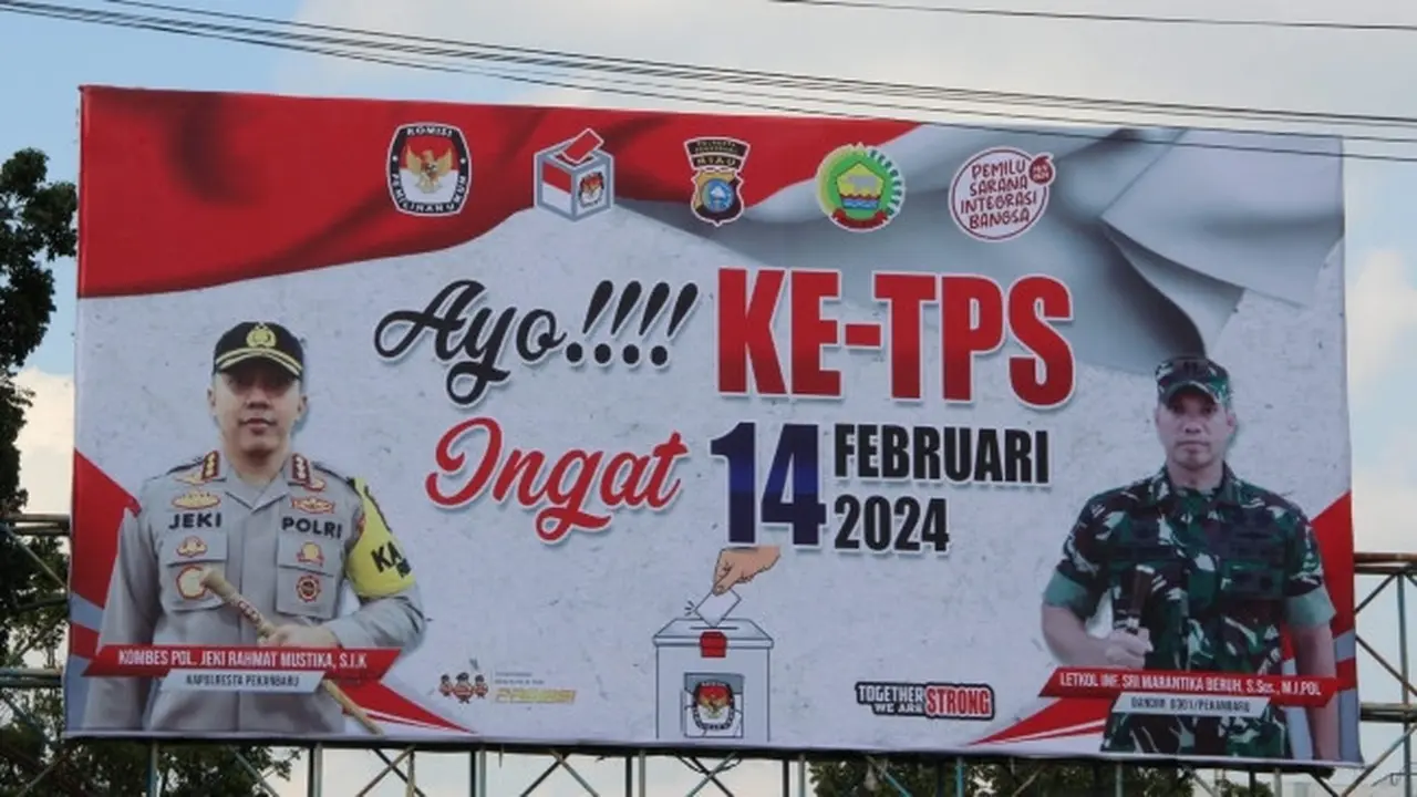Salah satu baliho besar dari Polresta Pekanbaru yang mengajak masyarakat datang ke TPS pada 14 Februari 2024.