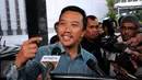 Menpora, Imam Nahrawi menjawab pertanyaan wartawan usai melakukan pertemuan dengan Ketua Umum PSSI 2011-2015, Djohar Arifin di Kemenpora, Jakarta, (23/6/2015). Hasil pertemuan akan dibahas saat RDP dengan Komisi X DPR RI. (Liputan6.com/Helmi Fithriansyah)