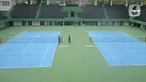 Petugas menyemprotkan cairan disinfektan pada area Lapangan Tennis Outdoor di Kompleks Olahraga GBK (Gelora Bung Karno), Senayan, Jakarta, Kamis (19/3/2020). Penyemprotan untuk mencegah penyebaran Virus Corona Covid-19 di Lingkungan Kompleks Olahraga GBK. (Liputan6.com/Herman Zakharia)