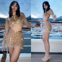 Lihat di sini beberapa potret gaya Lisa BLACKPINK saat hadiri F1 Monaco GP 2024 pakai outfit dari tutup botol dan wadah makanan bekas.