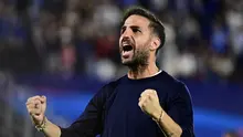 Pelatih Como, Cesc Fabregas, merayakan kemenangan timnya seusai pertandingan matchday 1 fase liga Liga Champions 2026/2027 melawan RB Leipzig di Stadion Giuseppe Sinigaglia, Como, Kamis (10/9/2026). (AFP/Piero Cruciatti)