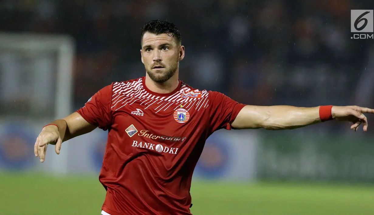 Pemain depan Persija, Marko Simic saat laga pertama semifinal Piala Presiden 2018 melawan PSMS di Stadion Manahan, Solo, Jawa Tengah, Sabtu (10/2). Marko Simic mencetak tiga gol. (Liputan6.com/Helmi Fithriansyah)