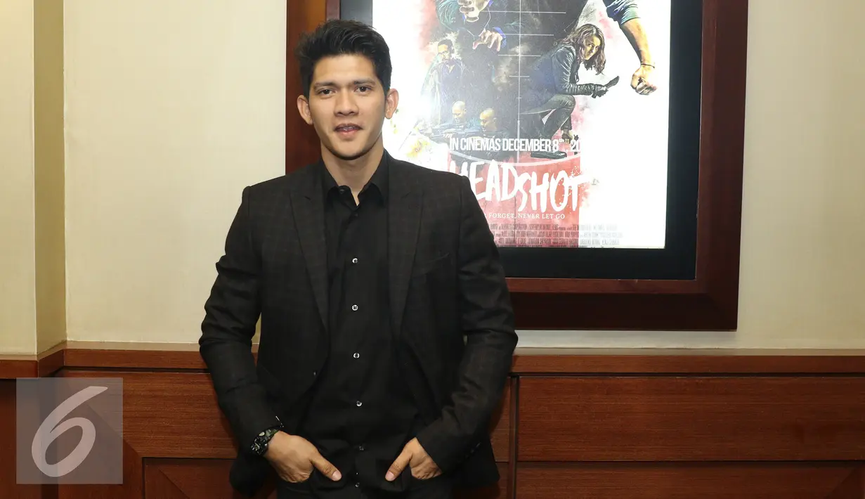 Iko Uwais berpose usai acara press screening dan jumpa press film Headshot di kawasan Senayan, Jakarta, Kamis (1/12). Film Headshot akan ditayangkan serentak pada 8 Des 2016. (Liputan6.com/Herman Zakharia)