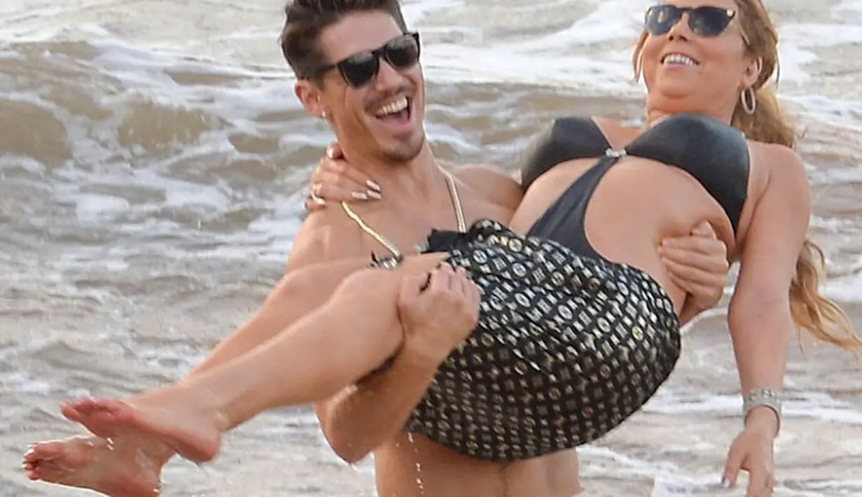 Berdasarkan foto-foto yang beredar, keduanya tampak menikmati waktu liburan itu dan sangat berbahagia. Dengan pose mesra yang terkesan menantang, menjadi bukti bahwa hubungan mereka lebih dari sekedar teman. (doc.dailymail.com)