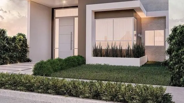 Rumah Minimalis dengan Atap Datar dan Jendela Lebar