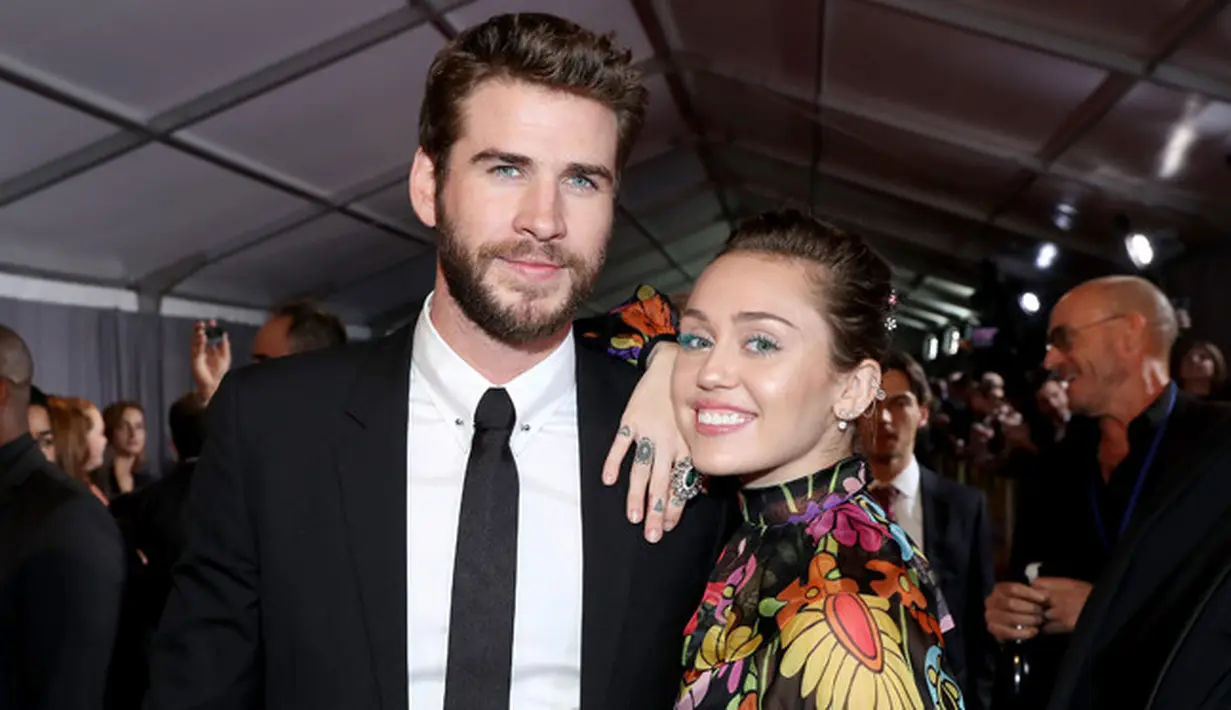 Bicara soal kisah asmara Miley Cyrus dan Liam Hemsworth memang tak aka nada habisnya. Selain kerap dikabarkan akan segera menikah, hubungan keduanya pun ternyata sempat kandas di tengah jalan. (AFP/Rich Polk)