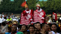 Kegiatan ini merupakan Kampanye Organisasi Aksi Solidaritas Era (Oase) sebagai bentuk perlawanan terhadap Narkoba, Pornografi, dan Kekerasan Terhadap Perempuan dan Anak di Bundaran HI, Jakarta, Minggu (4/9). (Liputan6.com/Johan Tallo)