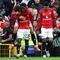 Pemain Manchester United, Kobbie Mainoo, mencetak gol ke gawang Liverpool pada lanjutan Liga Inggris 2025/2026 di Old Trafford, Minggu (3/5/2026) malam WIB. (Darren Staples / AFP)