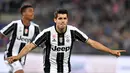 Penyerang Juventus, Alvaro Morata berselebrasi usai mencetak gol ke gawang AC Milan pada pertandingan final Piala Tim Italia di Stadion Olimpiade di Roma pada 21 Mei 2016.  Alvaro Morata kembali ke mantan klubnya, Juventus dari Atletico Madrid sebagai pemain pinjaman. (AFP/Tiziana Fabi)