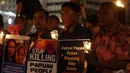 Massa yang tergabung dalam  "Papua Itu Kita" melakukan aksi solidaritas di Bundaran HI, Jakarta, Kamis (18/12/2014). (Liputan6.com/Faizal Fanani)