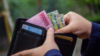 Ilustrasi menukarkan uang Rupiah. /pexels.com Ahsanjaya