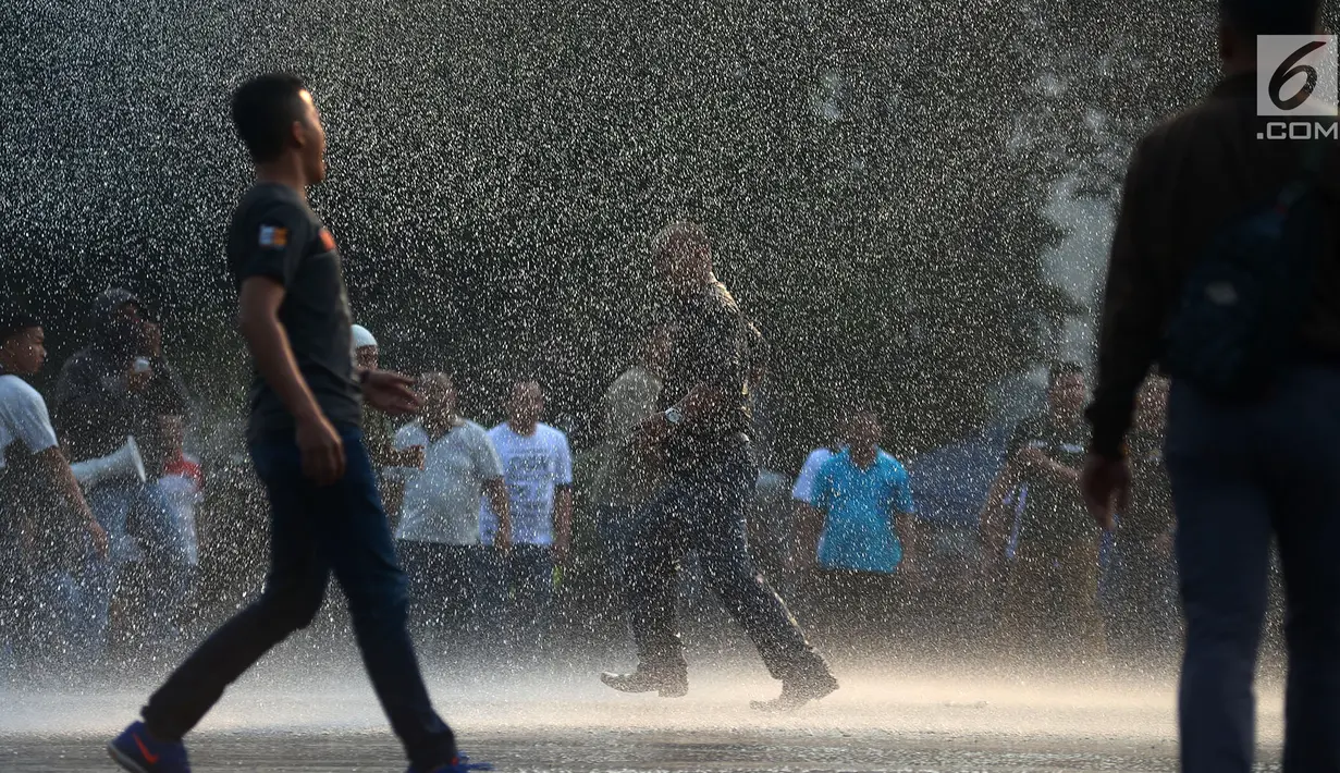 Suasana saat apel pengamanan Asian Games 2018 di Lapangan Ditlantas Polda Metro Jaya, Jakarta, Selasa (31/7). (Merdeka.com/Imam Buhori)