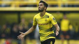 Nuri Sahin yang belum lama pensiun pada Juli 2022 bersama Antalyaspor memulai kariernya bersama Akademi Borussia Dortmund sejak 2001/2002 dan dipromosikan ke tim senior mulai 2005/2006. Pada 2011/2012 ia meninggalkan Dortmund untuk bergabung dengan Real Madrid. Hanya semusim bersama Madrid, ia dipinjamkan ke Liverpool selama setengah musim pada 2012/2013. Pada tengah musim 2012/2013 Madrid kembali meminjamkannya ke Dortmund yang akhirnya mempermanenkannya pada 2014/2015 dan bertahan hingga 2017/2018. Secara keseluruhan ia total tampil dalam 274 laga di semua kompetisi bareng Dortmund dengan torehan 26 gol dan 49 assist. (AFP/Ina Fassbender)