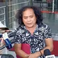 Tim penasihat hukum Indonesia Police Watch (IPW), Deolipa Yumara saat ditemui wartawan di Gedung KPK, Jakarta Selatan, Jumat (5/5/2023). (Liputan6.com/Fachrur Rozie)