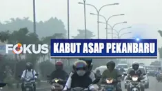 Kabut asap kembali selimuti Pekanbaru, aktivitas warga terganggu karena kualitas udara buruk dan jarak pandang turun.