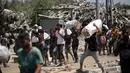 Badan Bantuan dan Pekerjaan Perserikatan Bangsa Bangsa (PBB) untuk Pengungsi Palestina (UNRWA) memperingatkan bahwa krisis kelaparan yang melanda hampir seluruh wilayah Gaza telah menghancurkan kehidupan banyak keluarga. (Eyad BABA/AFP)