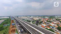 Foto Udara Tol Layang (Elevated) Jakarta-Cikampek (Japek) II di Tambun, Kabupaten Bekasi, Jawa Barat, Selasa (17/12/2019). Tol Layang Japek II mulai beroperasi untuk kendaraan golongan I tanpa tarif dengan minimum kecepatan 60 km dan Maksimum 80 km per jam (Liputan6.com/Zulfikar Abubakar)