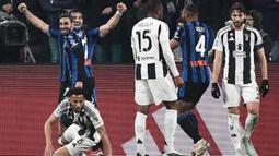 Berstatus tim tamu, Atalanta sukses mempermalukan Juventus dengan skor telak 4-0. (Isabella BONOTTO/AFP)