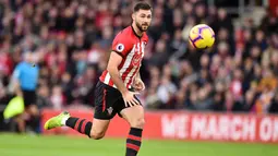 Charlie Austin - Mantan penggawa Southampton ini pernah menggeluti profesi yang cukup keras sebelum menjadi pesepak profesional. Pemain yang sempat dipanggil Timnas Inggris itu pernah bekerja sebagai tukang batu. (AFP/Glyn Kirk)