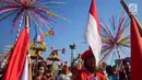Peserta mengikuti Karnaval Dugderan di Lapangan Simpanglima Semarang, Senin (14/5). Karnaval ini diadakan untuk menandai datangnya bulan Suci Ramadan dan digelar rutin tahunan. (Liputan6.com/Gholib)