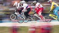 Pebalap sepeda BMX Indonesia, I Gusti Bagus Saputra, saat berlaga pada Asian Games di Pulomas International BMX Center, Jakarta, Sabtu (25/8/2018). Bagus Saputra meraih medali perak dengan catatan waktu 34,314 detik. (Bola.com/Peksi Cahyo)
