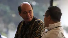 Staf Khusus Presiden Bidang Komunikasi Politik Daniel Sparingga datangi KPK, Jakarta, Selasa (9/9/2014) (Liputan6.com/Panji Diksana)