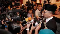 Chatib Bisri memberikan keternagan pada wartawan usai dirinya dilanti menjadi Menteri Keuangan yang Baru (Foto: Rumah Tangga Kepresidenan)