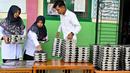 Hingga awal September 2025, realisasi Program Makan Bergizi Gratis (MBG) di Aceh telah mencapai 43 persen. (CHAIDEER MAHYUDDIN/AFP)