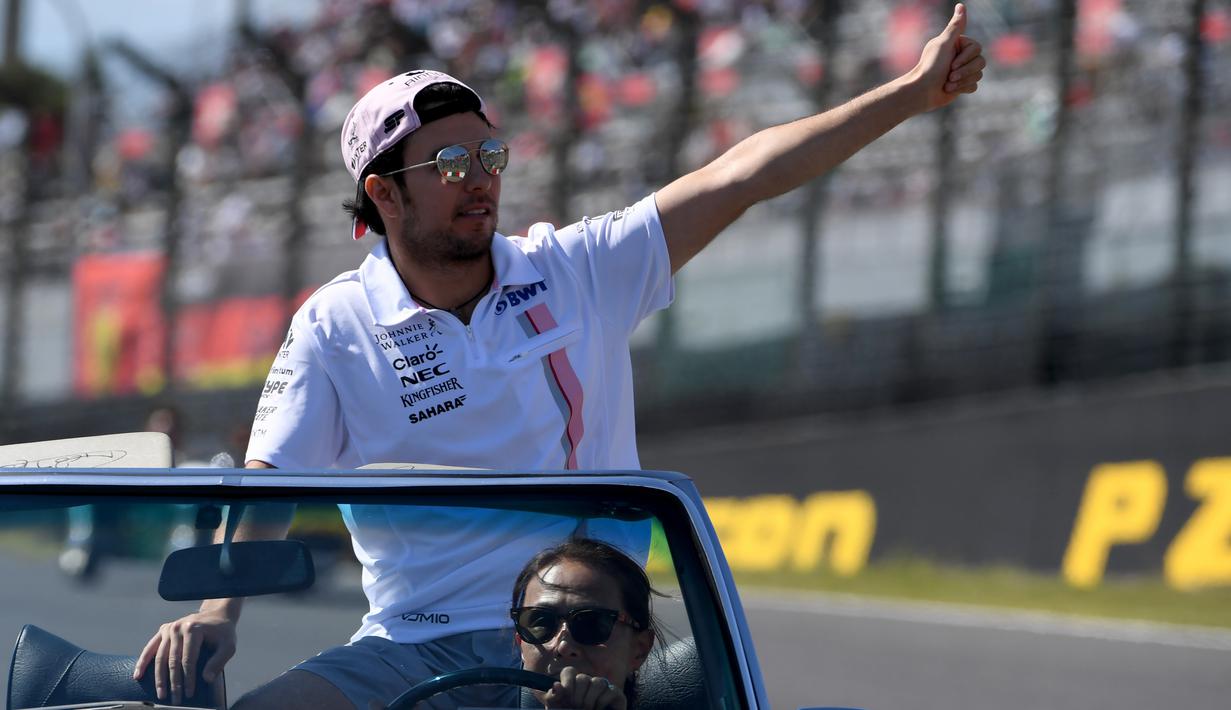 Pebalap Force India asal Mexico, Sergio Perez menempati peringkat ketujuh dengan koleksi 82 poin hingga balapan F1 GP Jepang. (AFP/Toshifumi Kitamura)