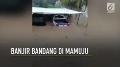 Hujan lebat terus mengguyur kota Mamuju, Sulawesi Barat,  mengakibatkan banjir setinggi 2 meter.