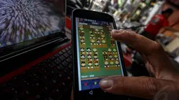 Game yang hanya dapat dimainkan di handphone yang menggunakan sistem Android ini dibuat semenjak ketok palu bahwa Pilkada akan dipilih melalui DPRD, Jakarta, (7/10/14). (Liputan6.com/Faizal Fanani) 