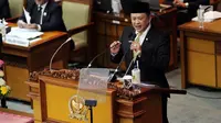 Ketua DPR Bambang Soesatyo berpidato dalam Rapat Paripurna ke-19 di Kompleks Parlemen, Senayan, Jakarta, Senin (5/3). Bambang berpidato dengan judul 'Kami Pelayan Rakyat'. (Merdeka.com/Iqbal Nugroho)