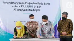 Penandatanganan kerja sama ILUNI UI, RSUI, dan Arogya.ai di Kampus UI Depok  ini memanfaatkan teknologi AI berbasis infrastruktur ICT (Information and Communication Technology) untuk mendukung supply chain dan administrasi rumah sakit guna menciptakan inovasi. (Liputan6.com/HO/ILUNI UI)