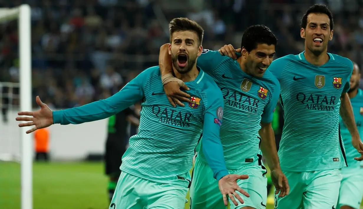 Selebrasi pemain Barcelona setelah Gerard Pique mencetak gol kemenangan ke gawang Borussia Monchengladbach pada laga kedua Grup C Liga Champions di Stadion im Borussia-Park, Kamis (29/9/2016) dini hari WIB. (AFP/Odd Andersen)